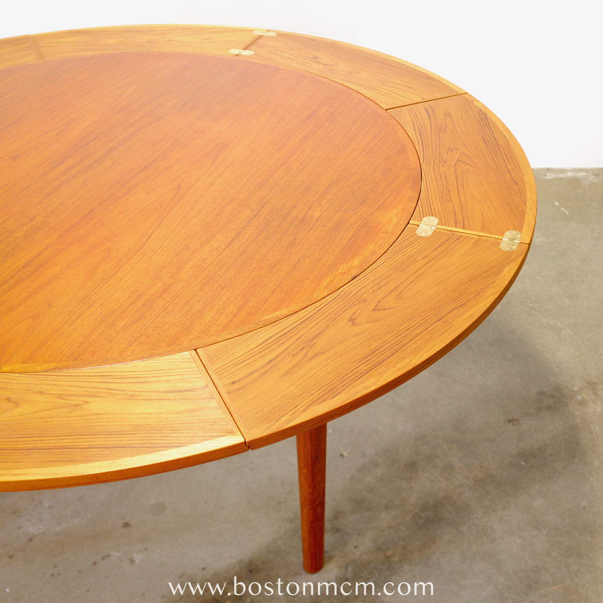 Dyrlund “Lotus” Round Dining Table with Hidden Expandable Leaves - #A2261