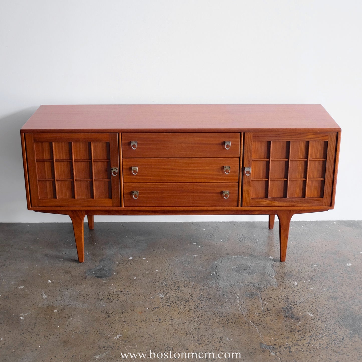 A. Younger Teak Credenza