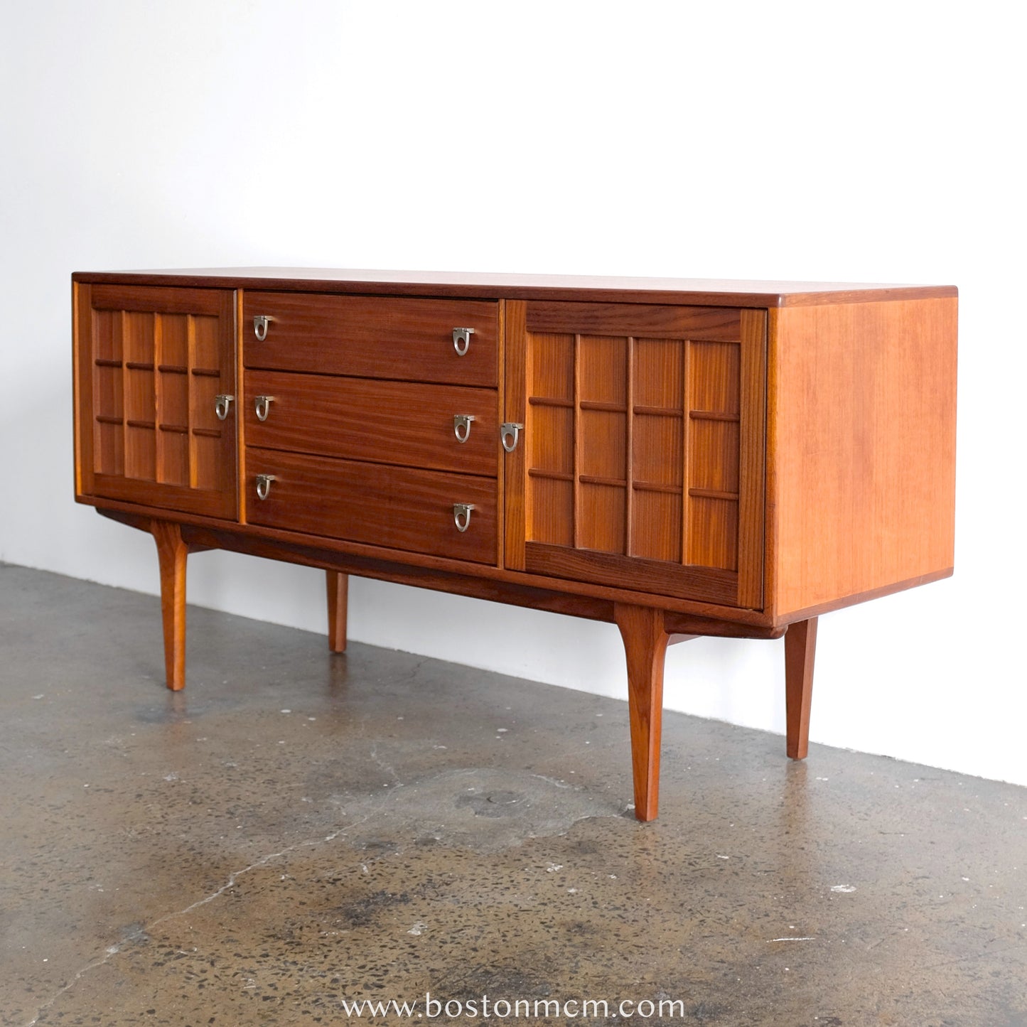A. Younger Teak Credenza