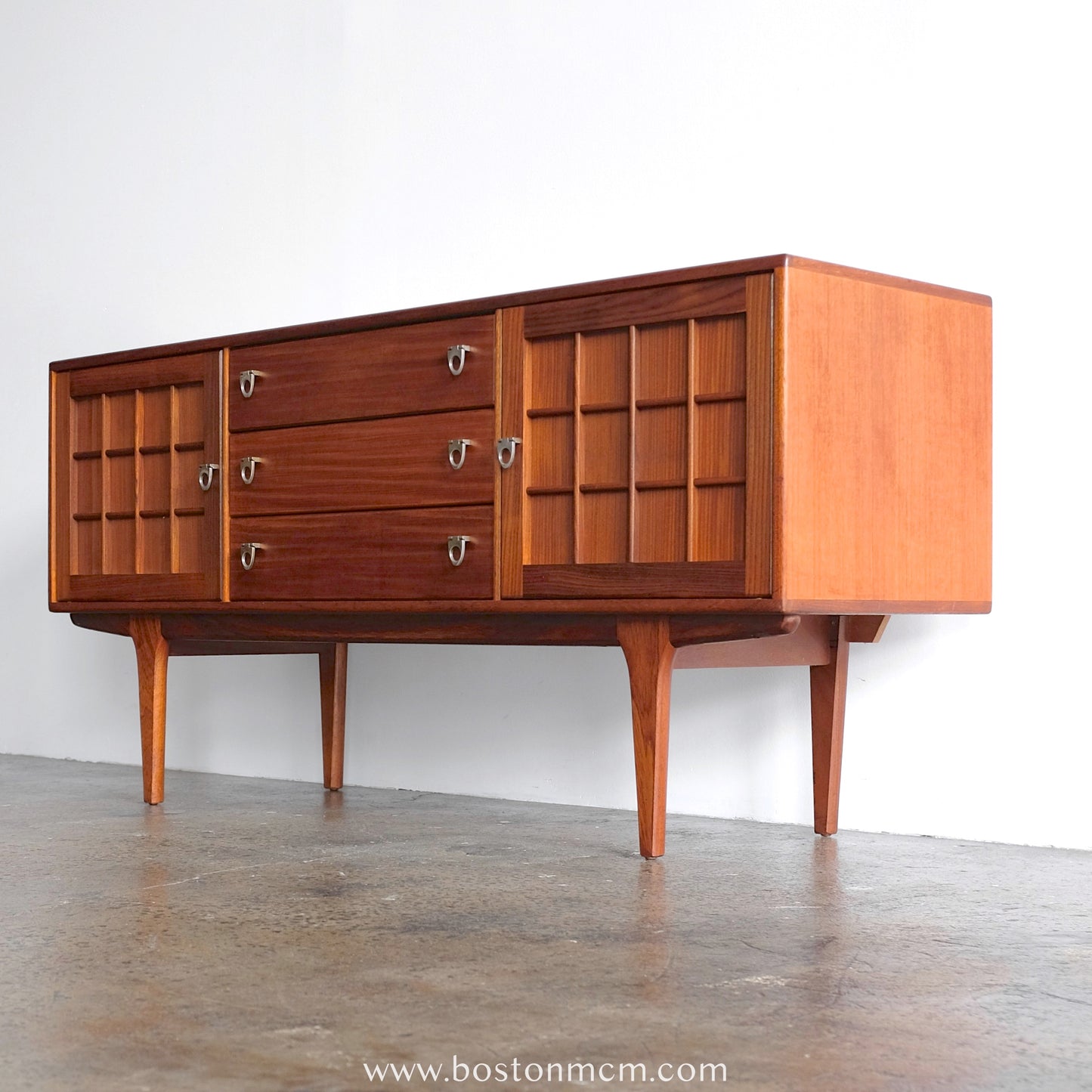 A. Younger Teak Credenza