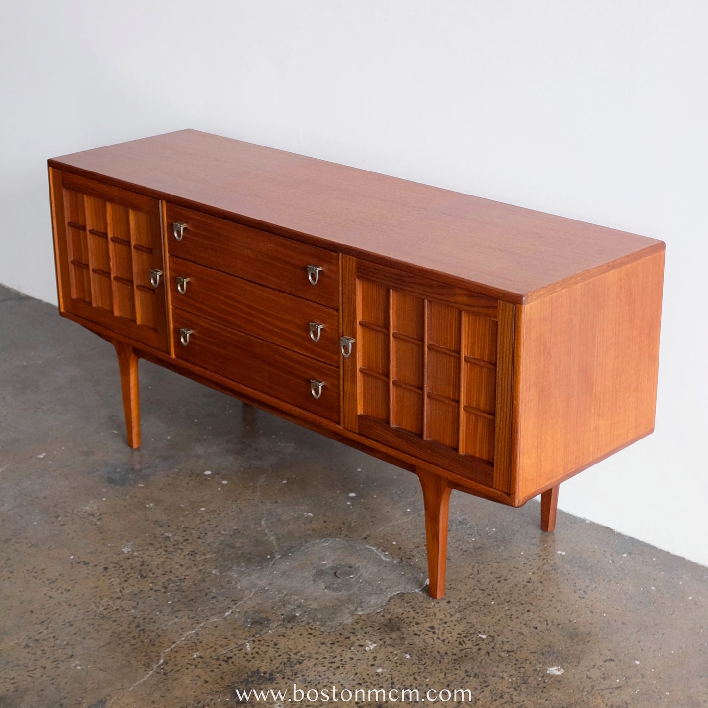 A. Younger Teak Credenza