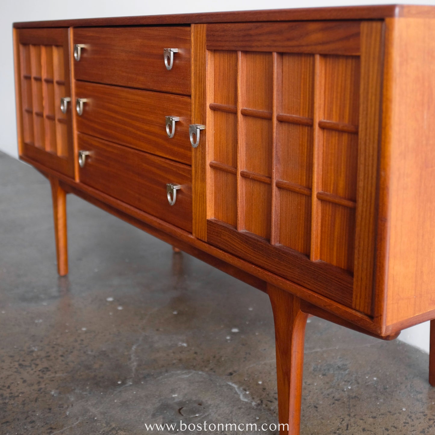 A. Younger Teak Credenza