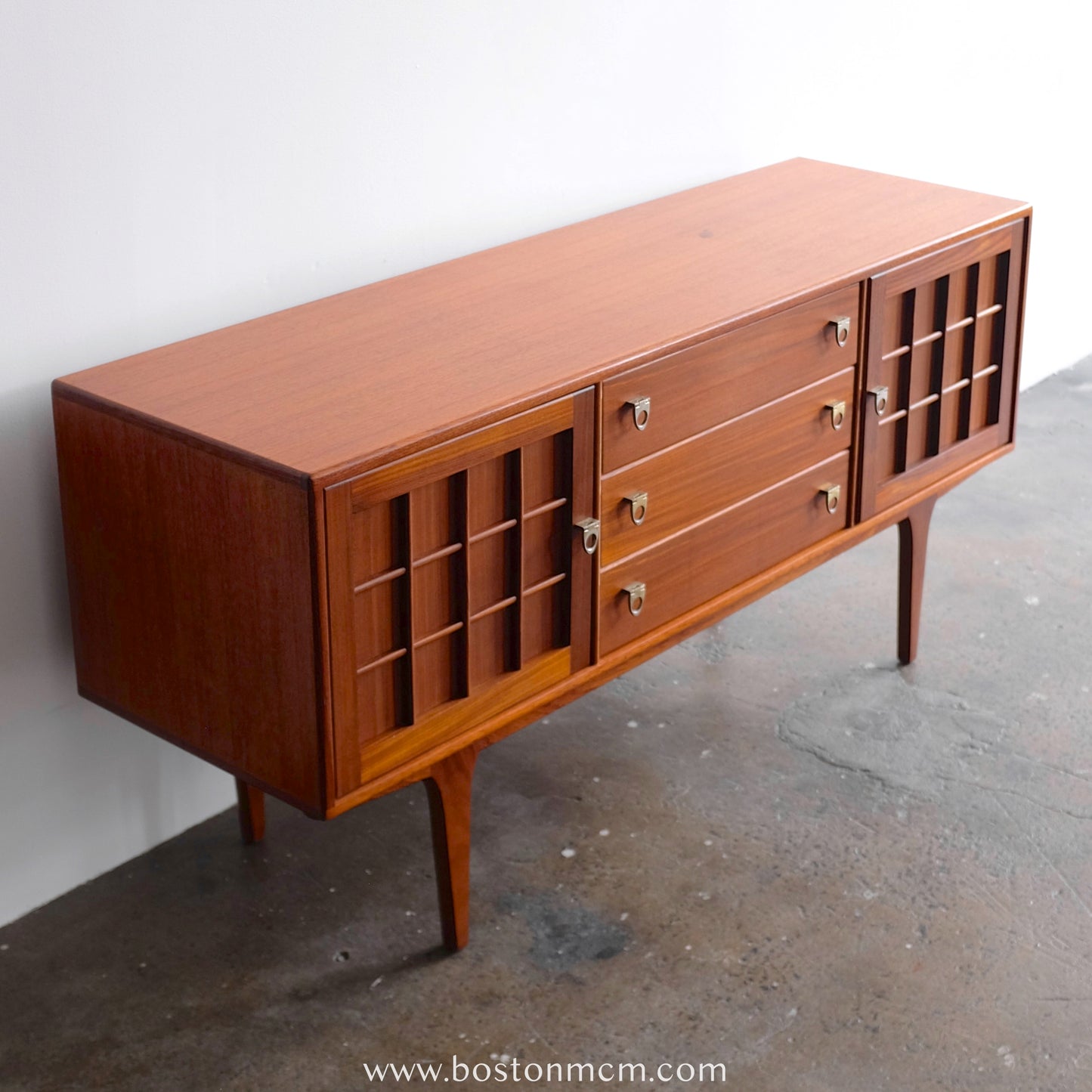 A. Younger Teak Credenza