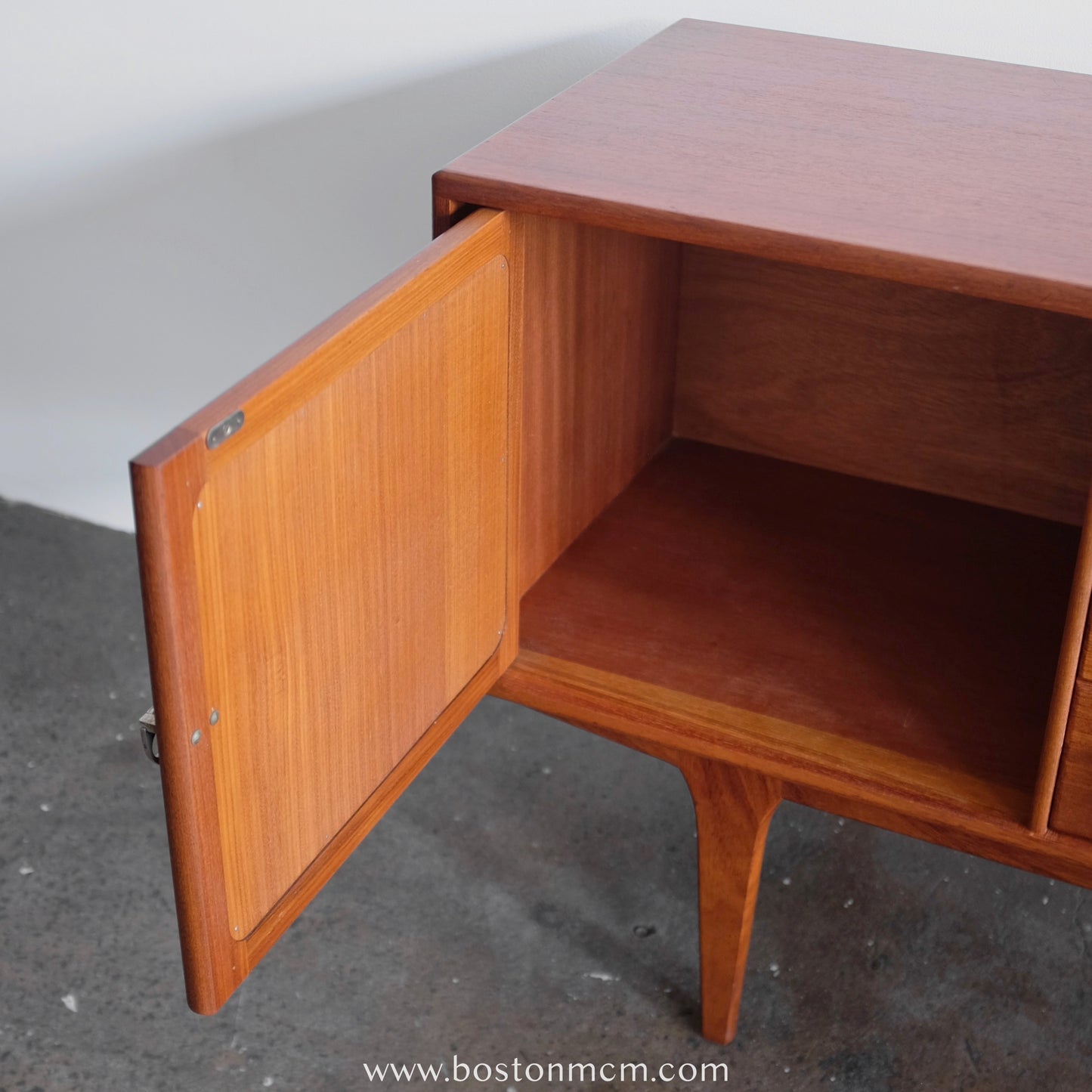 A. Younger Teak Credenza