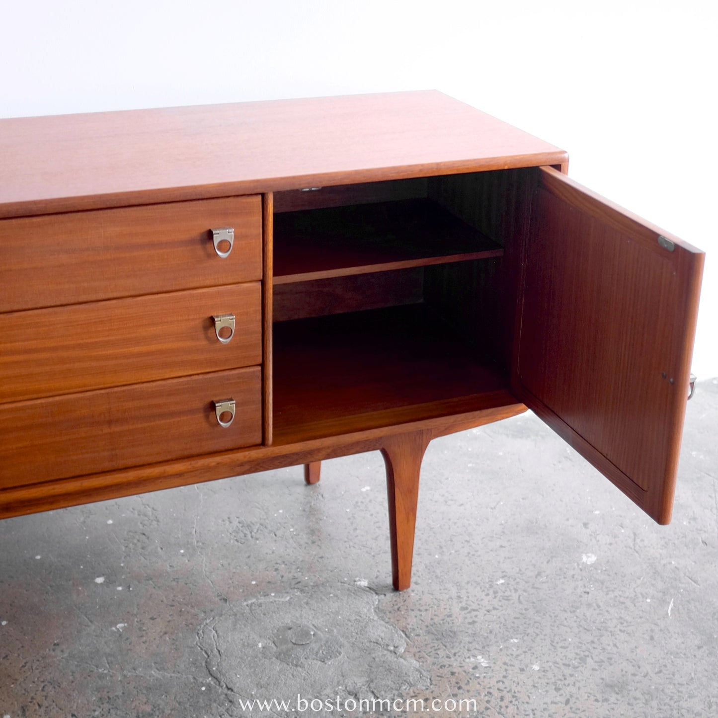 A. Younger Teak Credenza