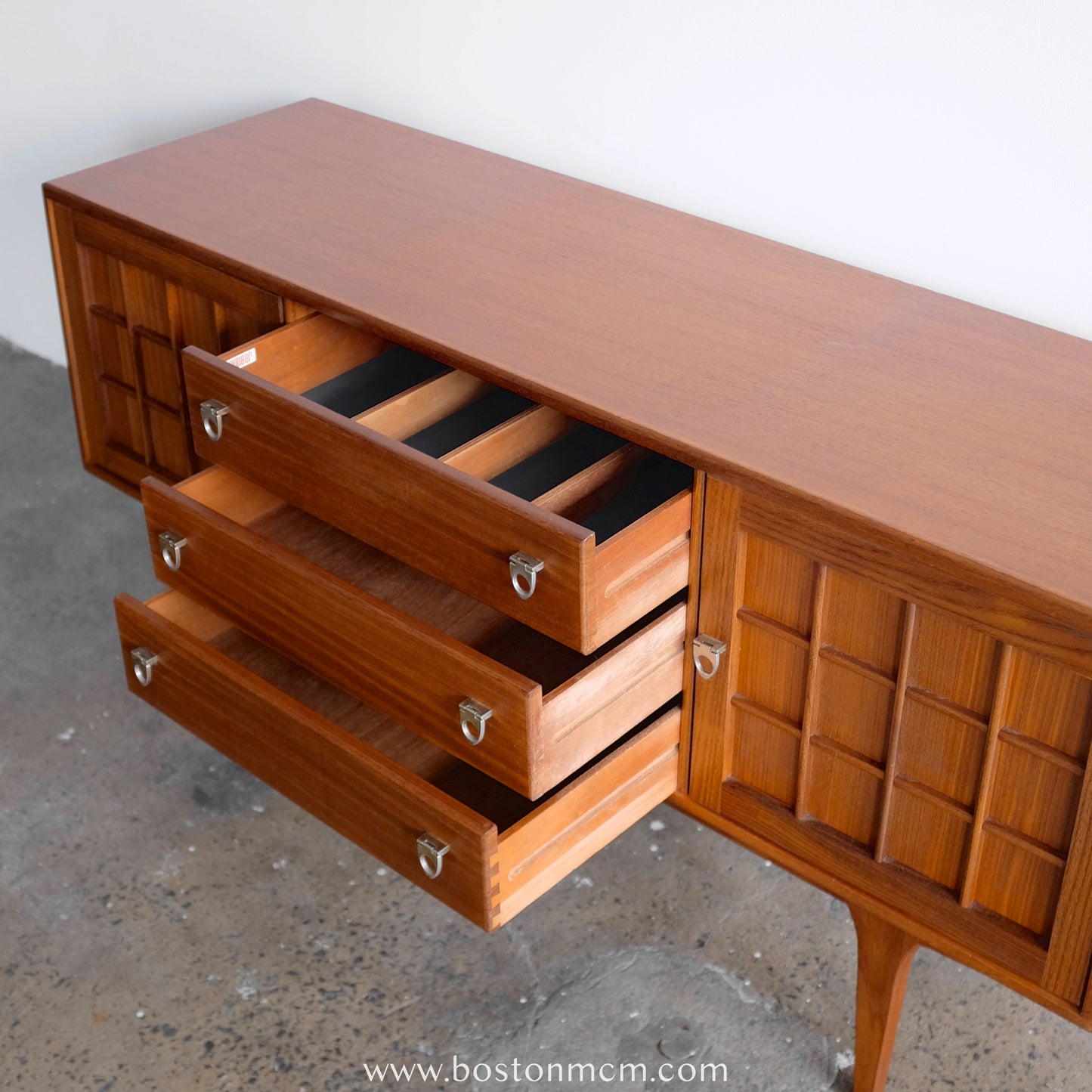 A. Younger Teak Credenza