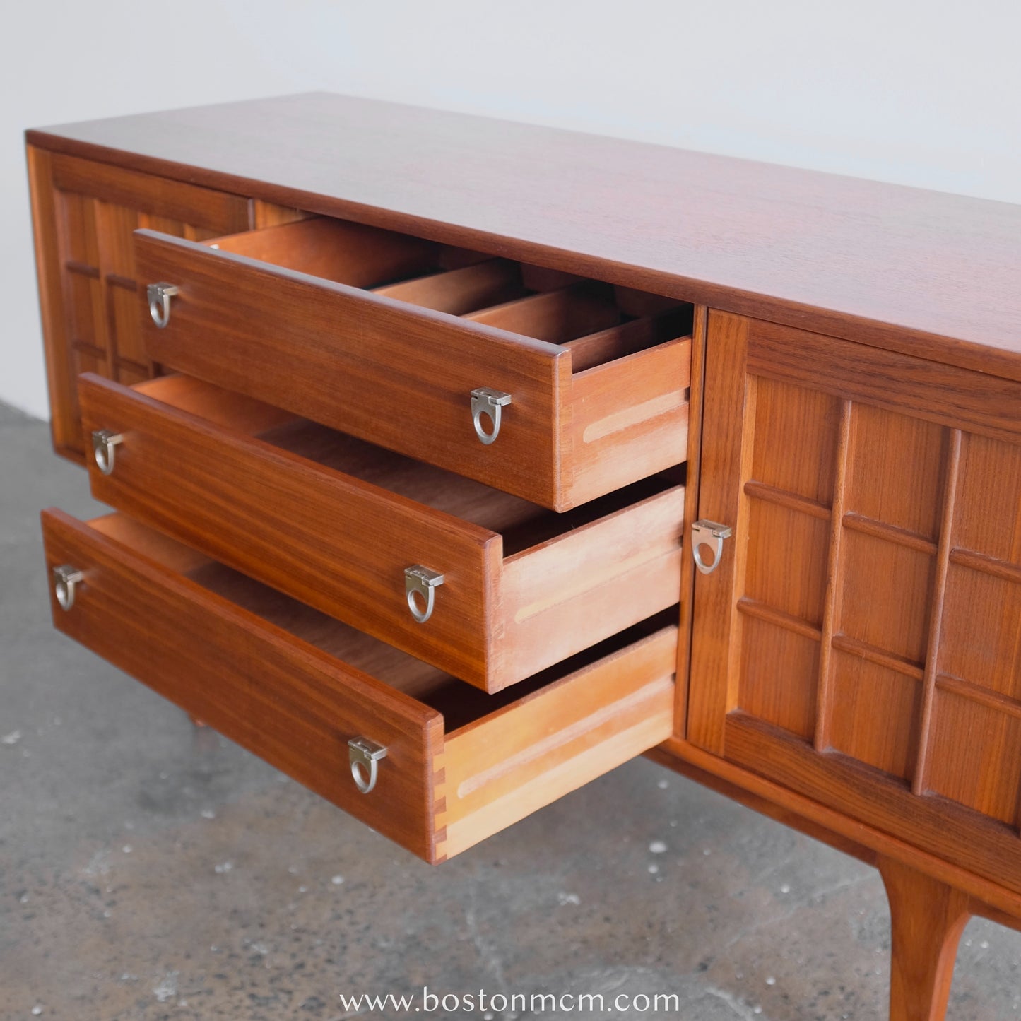 A. Younger Teak Credenza