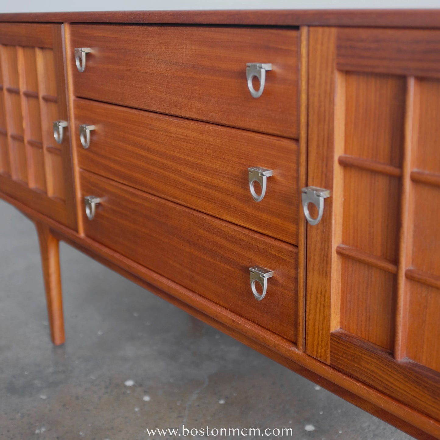 A. Younger Teak Credenza
