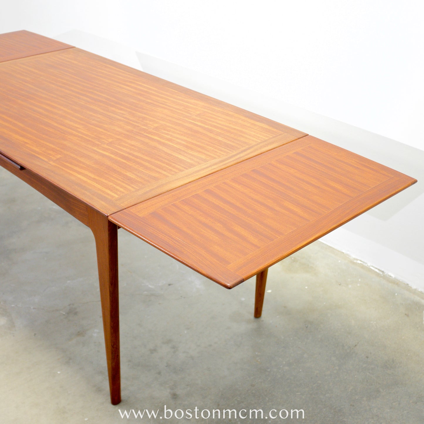 A. Younger Teak Draw-Leaf Dining Table