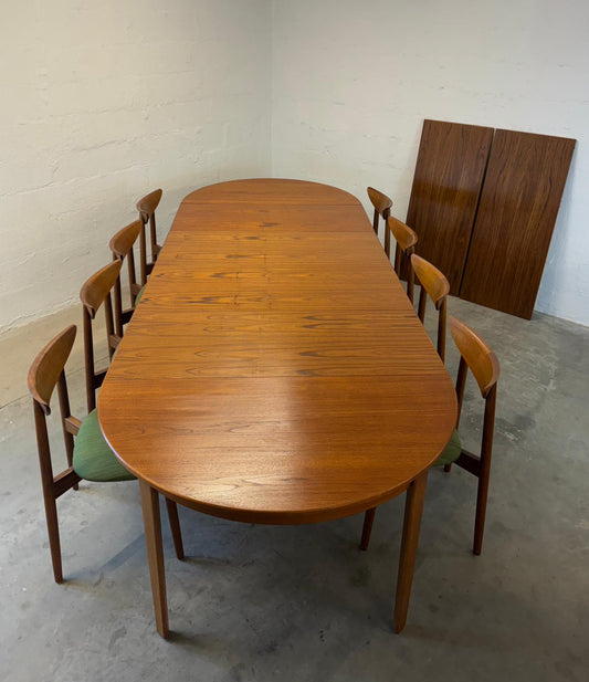 Danish Round Teak Dining Table with 6 Leaves Designed by Henning Kjaernulf - #A2114