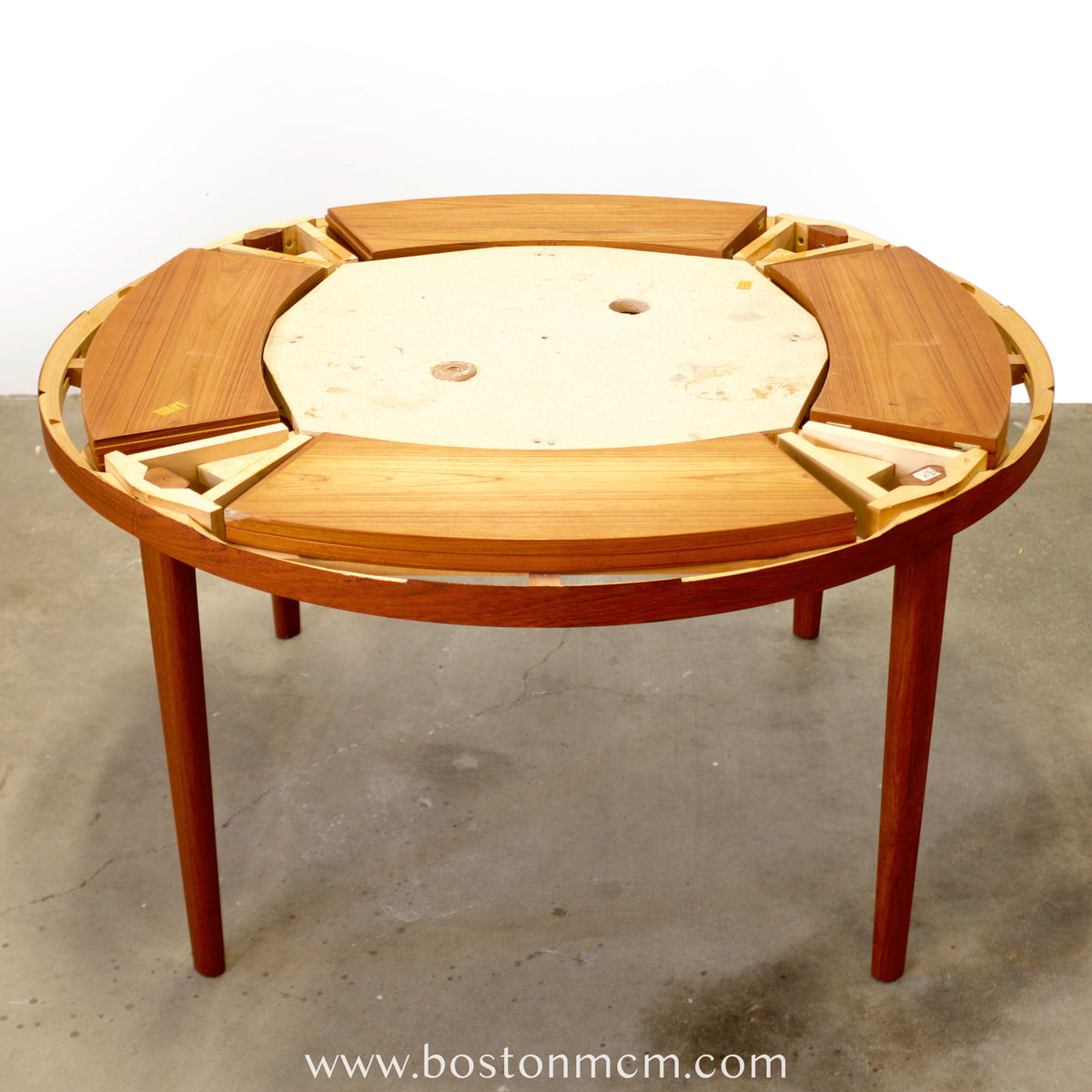 Dyrlund “Lotus” Round Dining Table with Hidden Expandable Leaves - #A2261