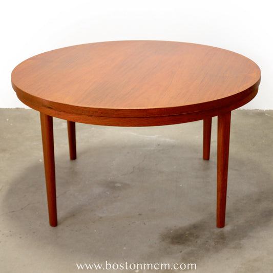 Dyrlund “Lotus” Round Dining Table with Hidden Expandable Leaves - #A2261