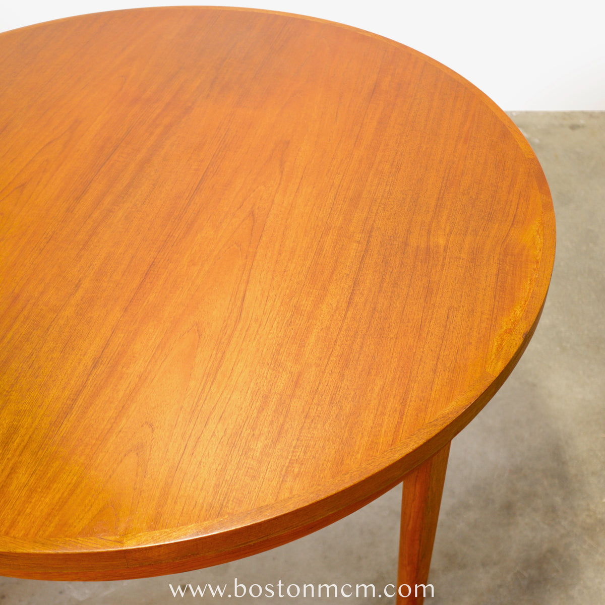 Dyrlund “Lotus” Round Dining Table with Hidden Expandable Leaves - #A2261