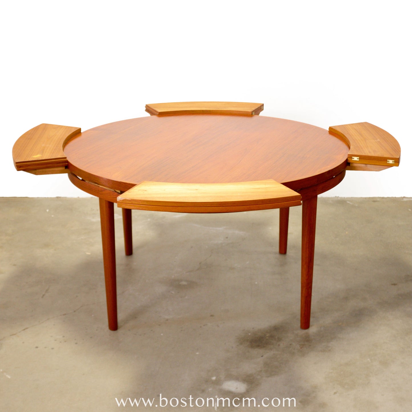 Dyrlund “Lotus” Round Dining Table with Hidden Expandable Leaves - #A2261