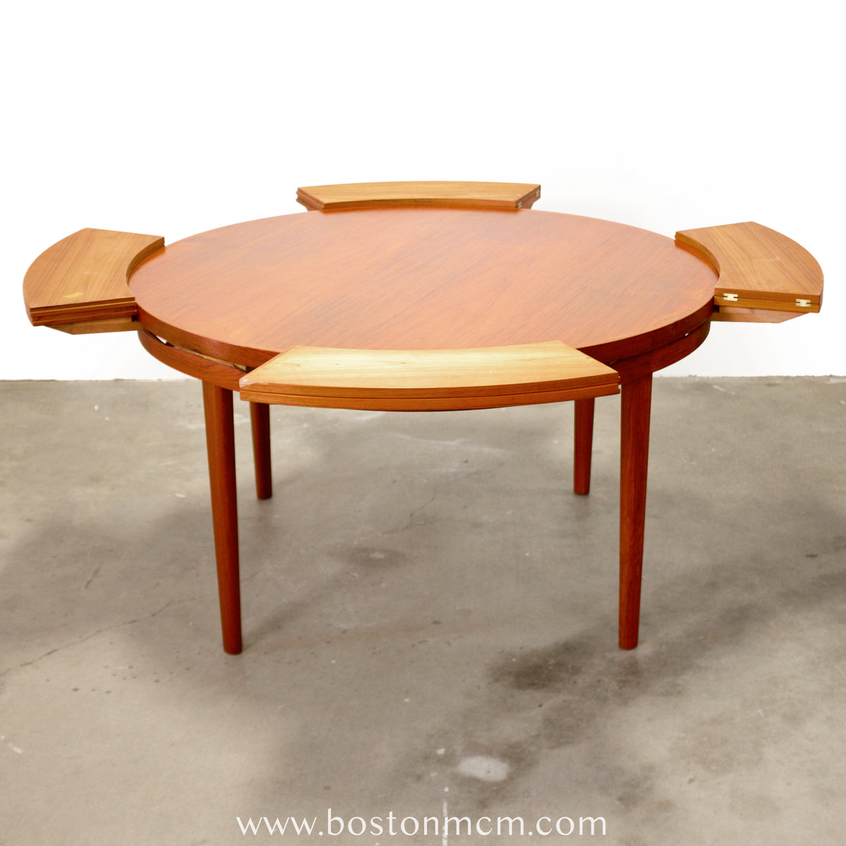 Dyrlund “Lotus” Round Dining Table with Hidden Expandable Leaves - #A2261