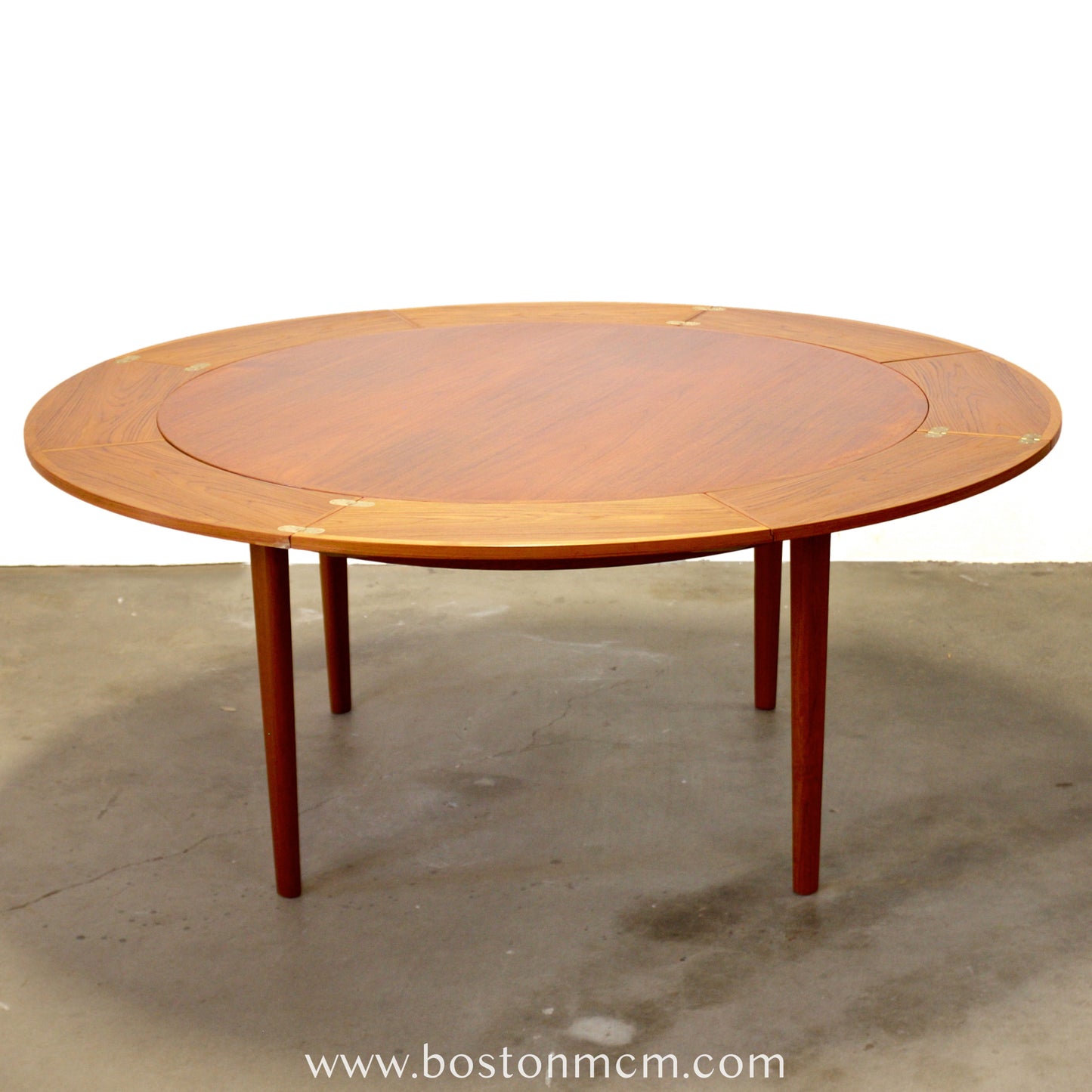 Dyrlund “Lotus” Round Dining Table with Hidden Expandable Leaves - #A2261