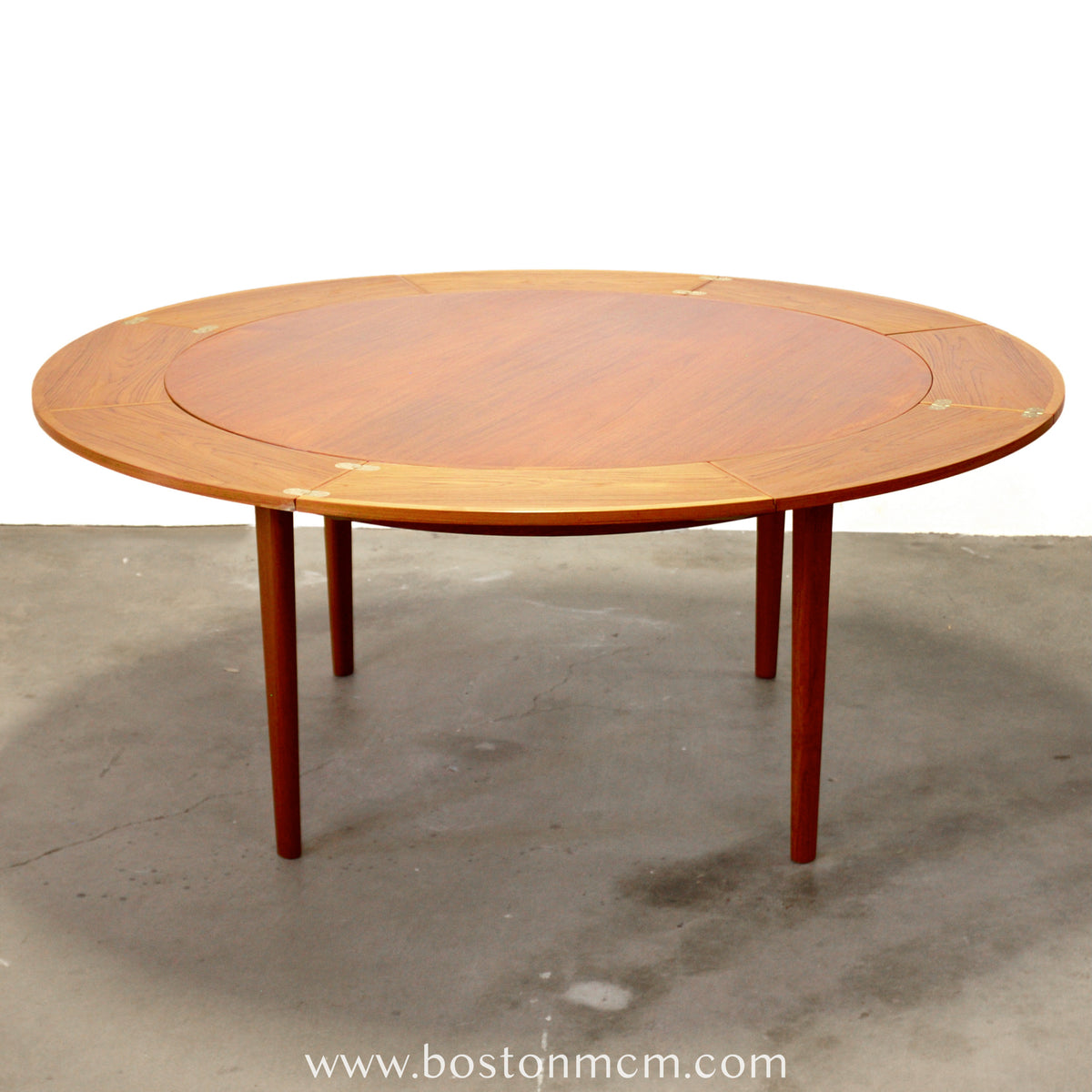 Dyrlund “Lotus” Round Dining Table with Hidden Expandable Leaves - #A2261