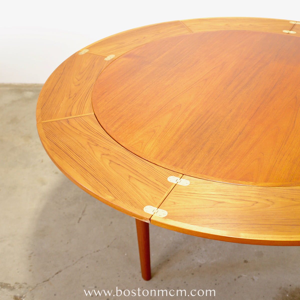 Dyrlund “Lotus” Round Dining Table with Hidden Expandable Leaves - #A2261