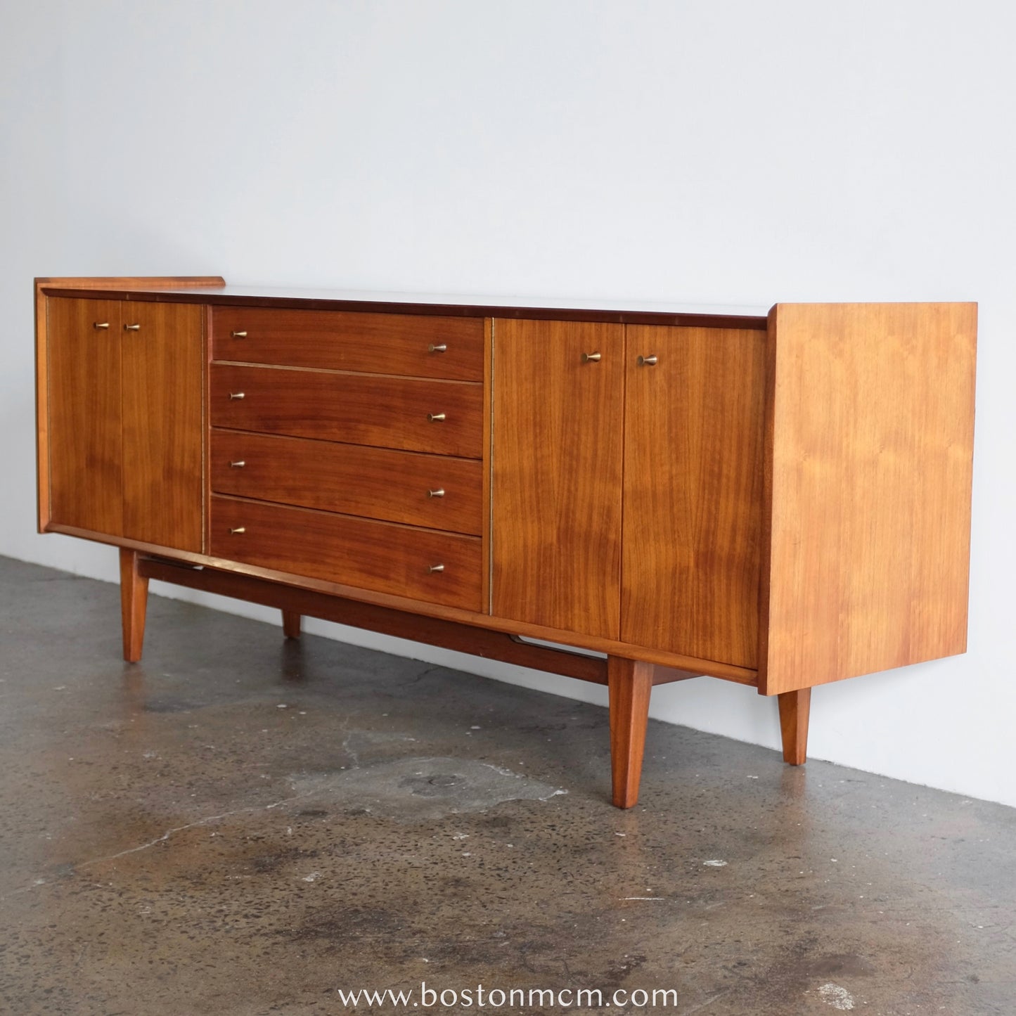 A. Younger Teak Credenza