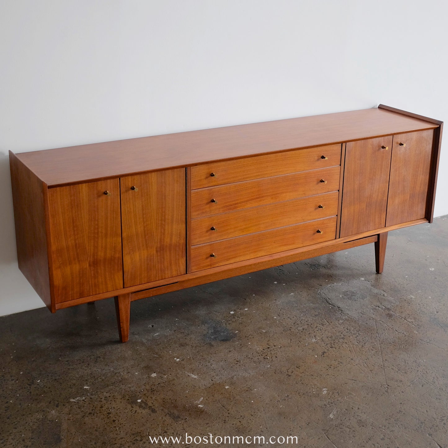 A. Younger Teak Credenza