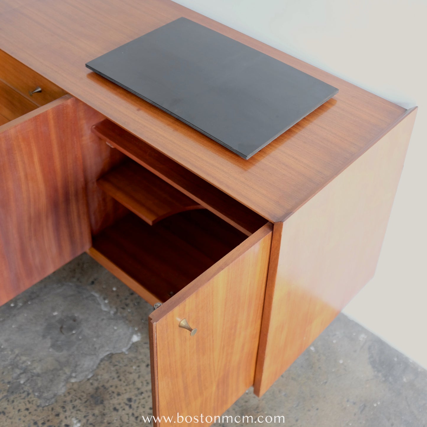 A. Younger Teak Credenza