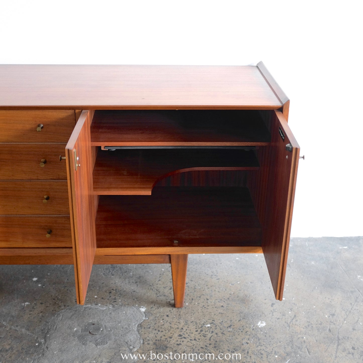 A. Younger Teak Credenza