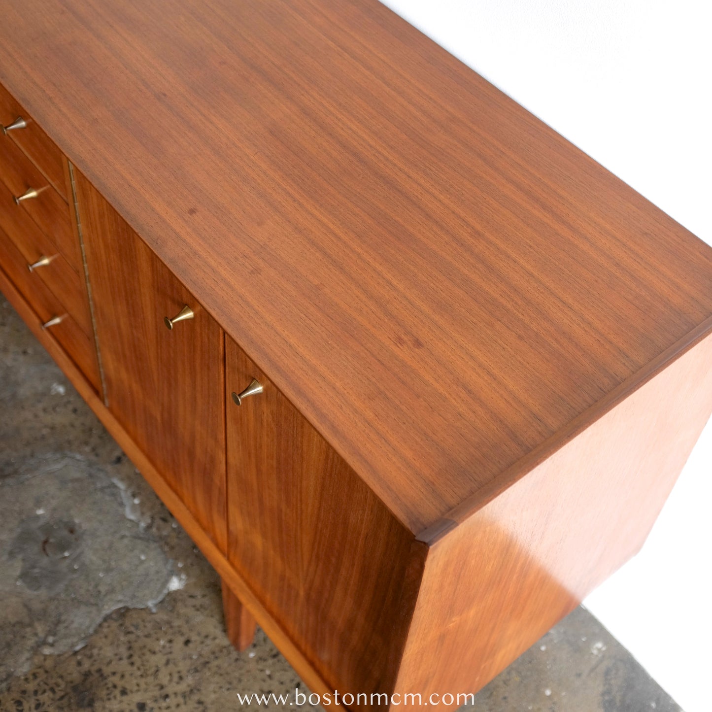 A. Younger Teak Credenza