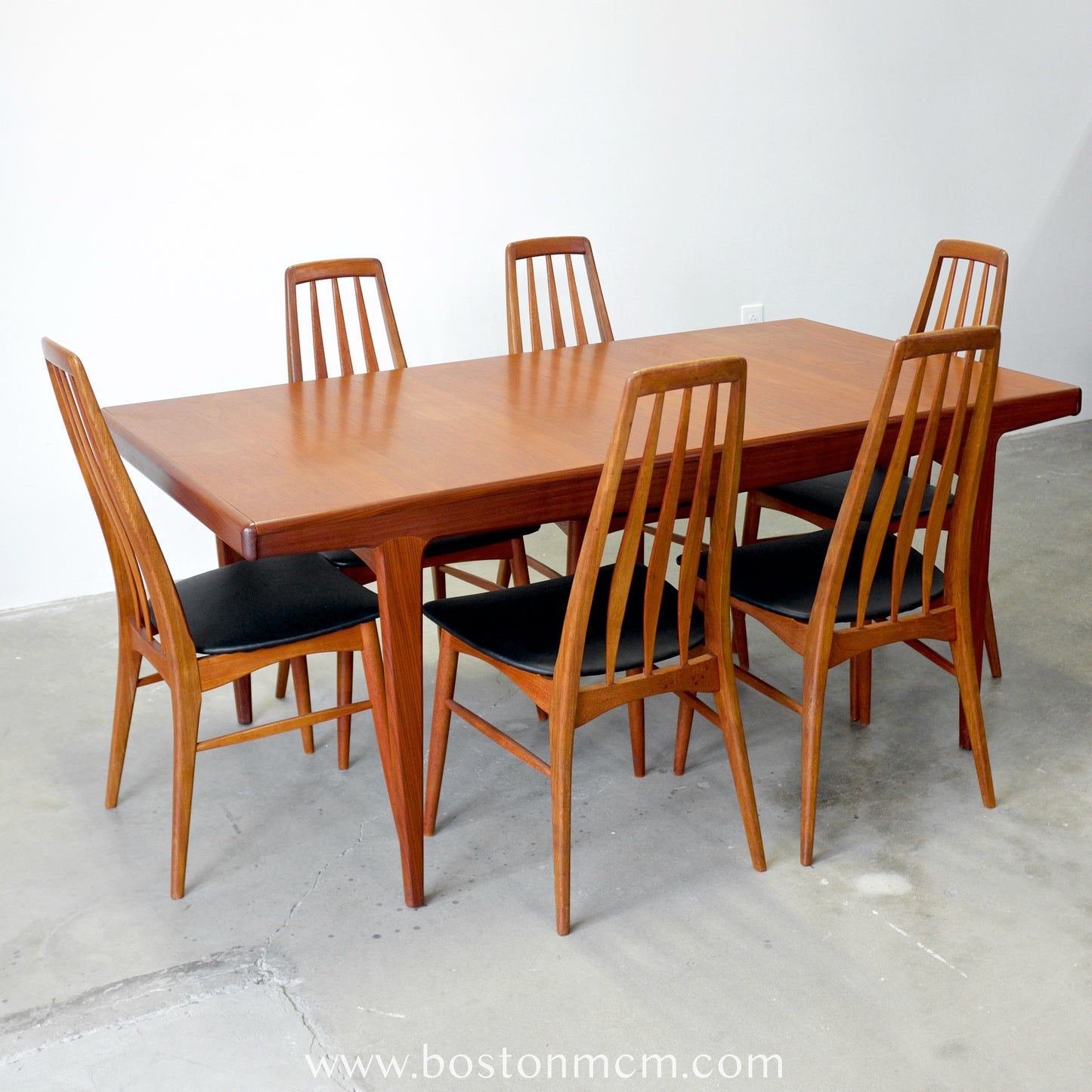 A. Younger Furniture Teak Dining Table with Hidden Leaves