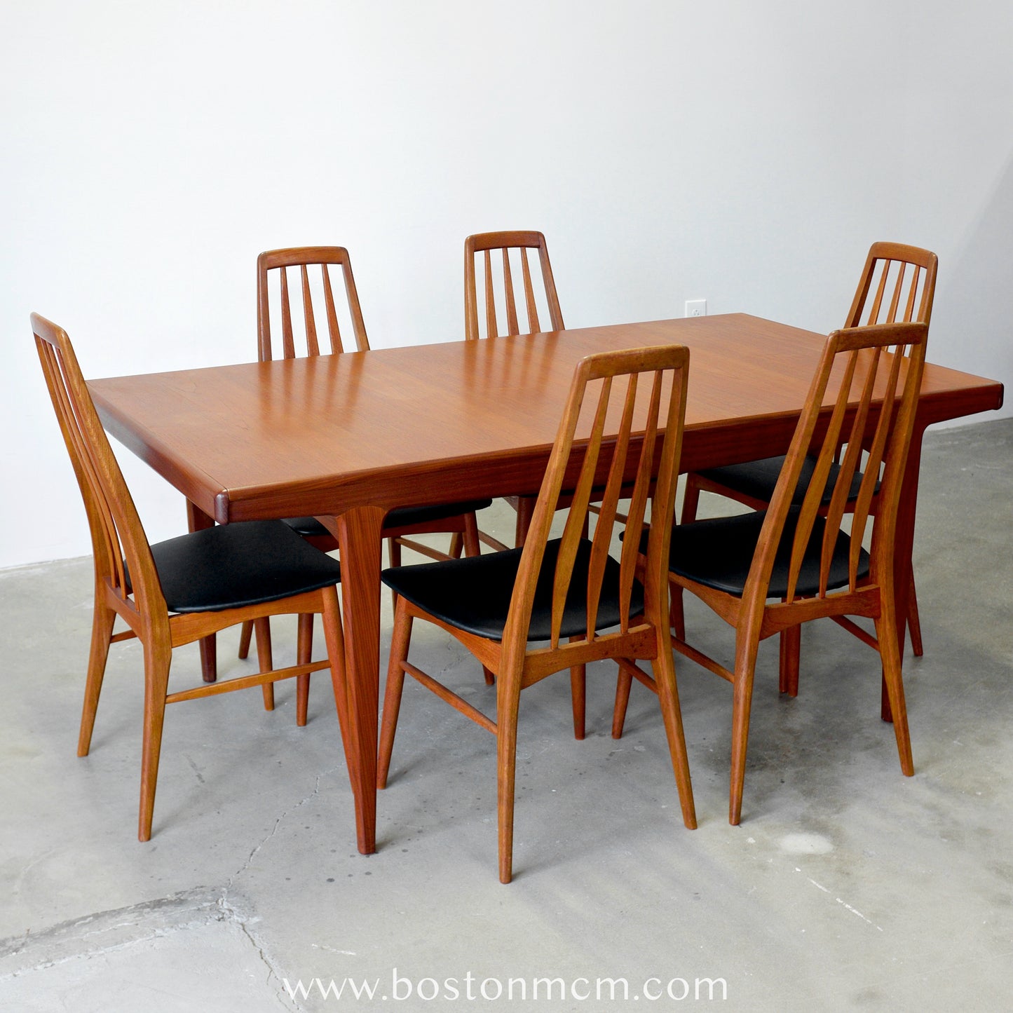 A. Younger Furniture Teak Dining Table with Hidden Leaves