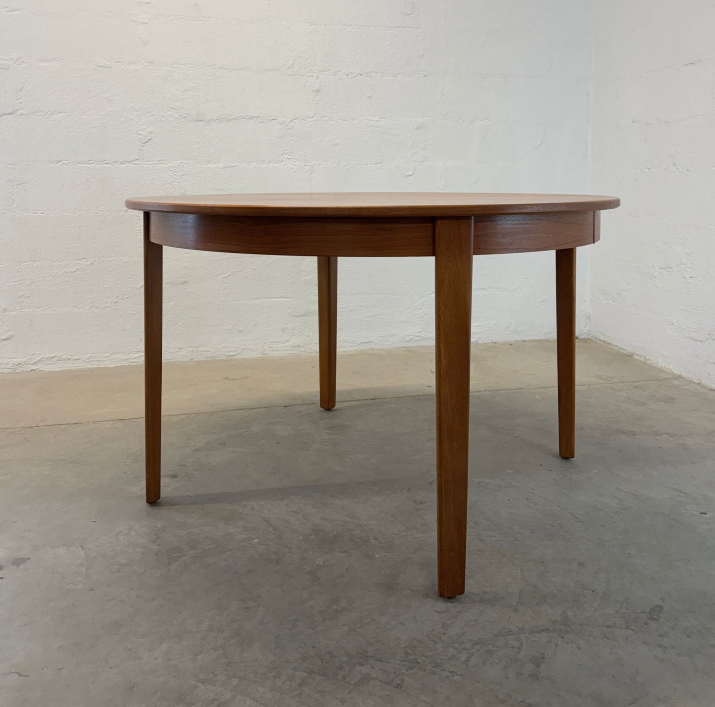 Danish Round Teak Dining Table with 6 Leaves Designed by Henning Kjaernulf - #A2114