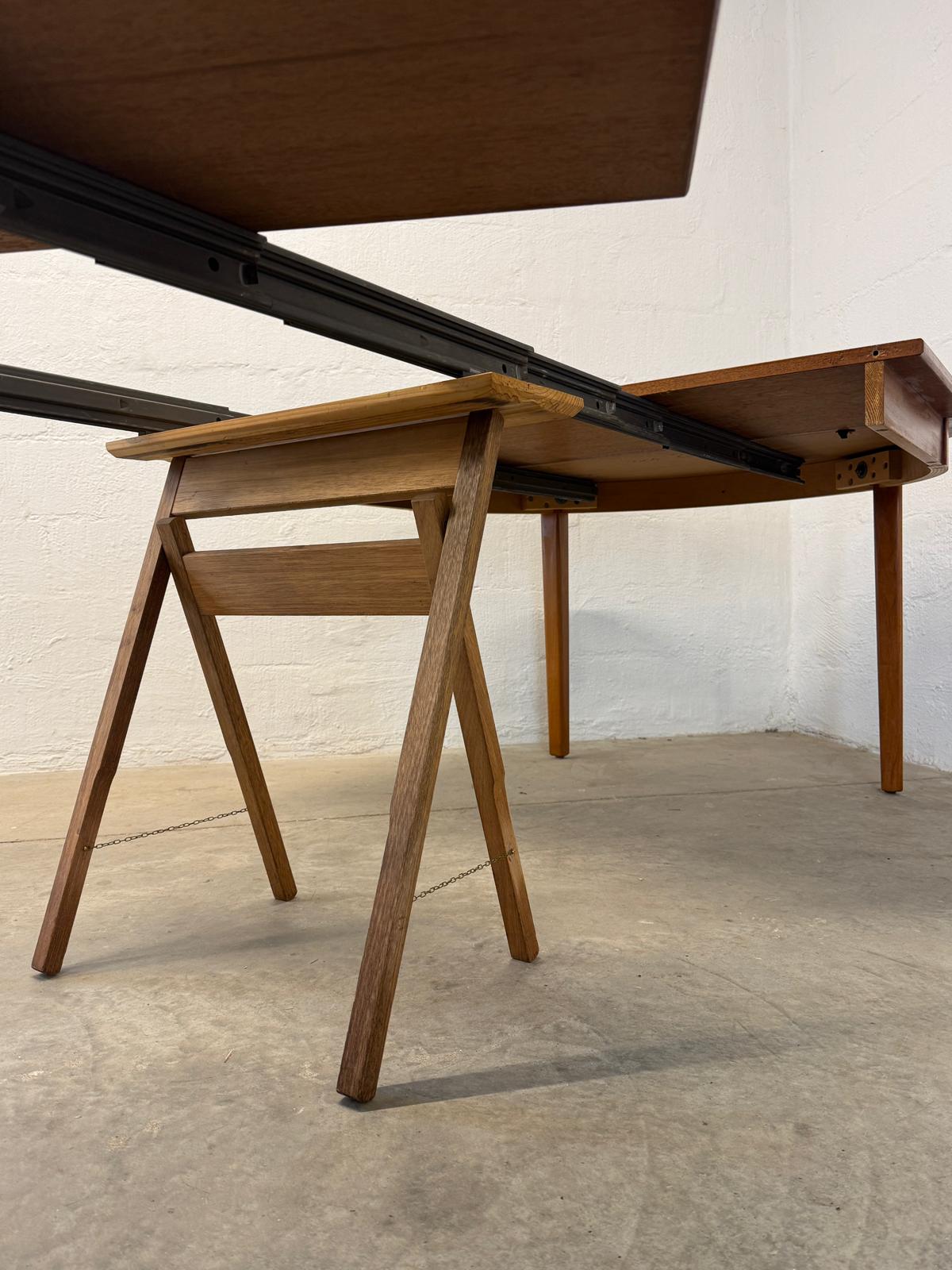 Danish Round Teak Dining Table with 6 Leaves Designed by Henning Kjaernulf - #A2114