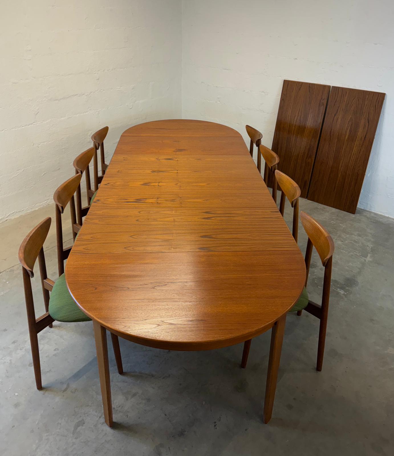 Danish Round Teak Dining Table with 6 Leaves Designed by Henning Kjaernulf - #A2114