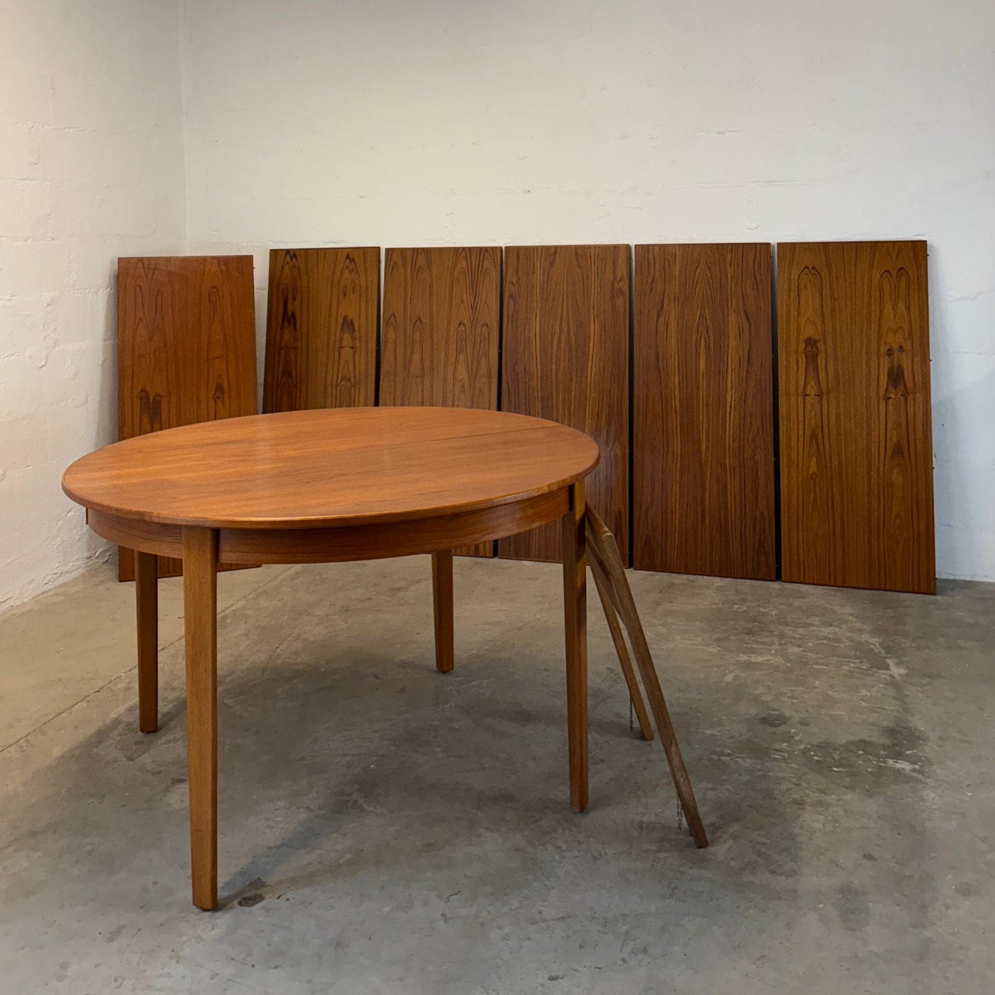 Danish Round Teak Dining Table with 6 Leaves Designed by Henning Kjaernulf - #A2114